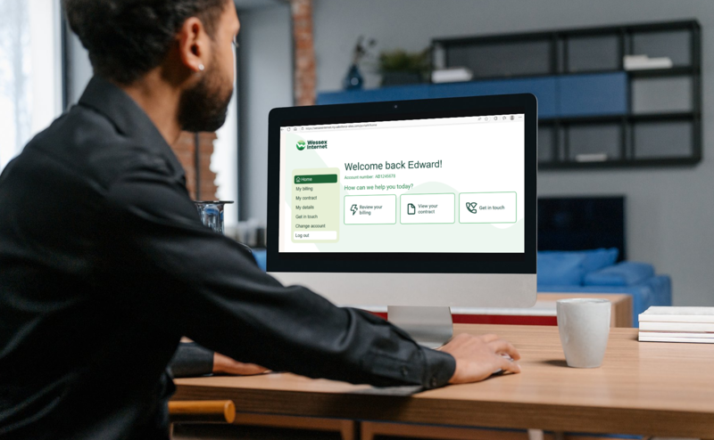 Man viewing the Wessex Internet online account on a computer screen